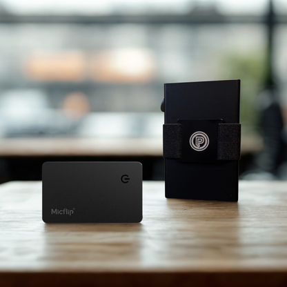 PoofTech Essential Carry Bundle with Slim RFID Wallet and Micflip Air Card on wooden surface