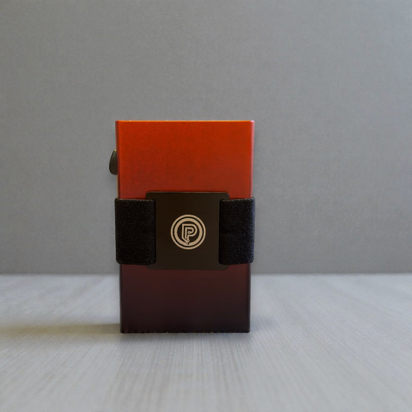 PoofTech Slim RFID Wallet front view with PoofTech logo in Ember