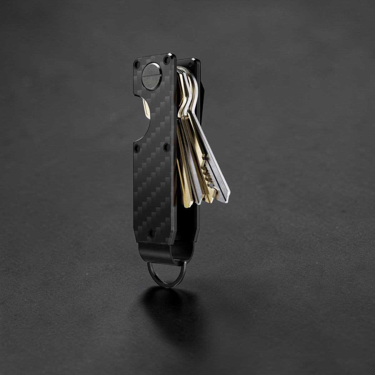 PoofTech Smart Key Organizer with keys in carbon fiber black