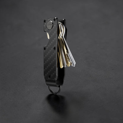 PoofTech Smart Key Organizer with keys in carbon fiber black