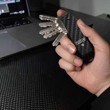PoofTech Smart Key Organizer held in hand